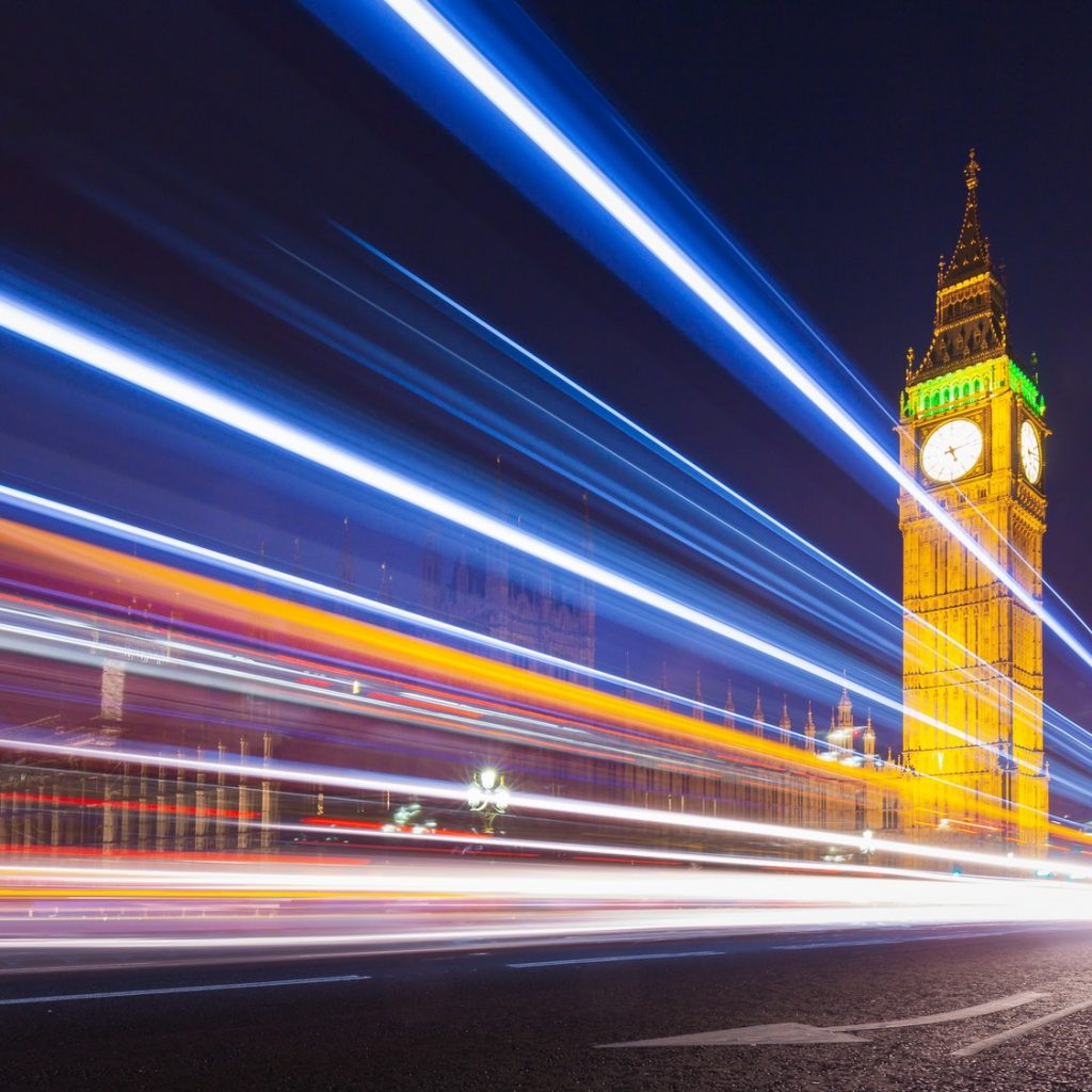 London Big Ben and Parliament with Bus Light Trails at Night, UK.