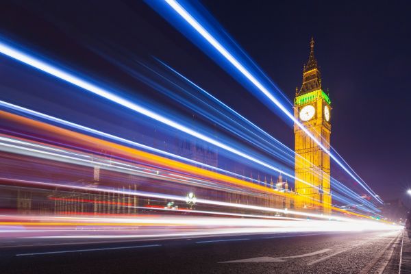 London Big Ben and Parliament with Bus Light Trails at Night, UK